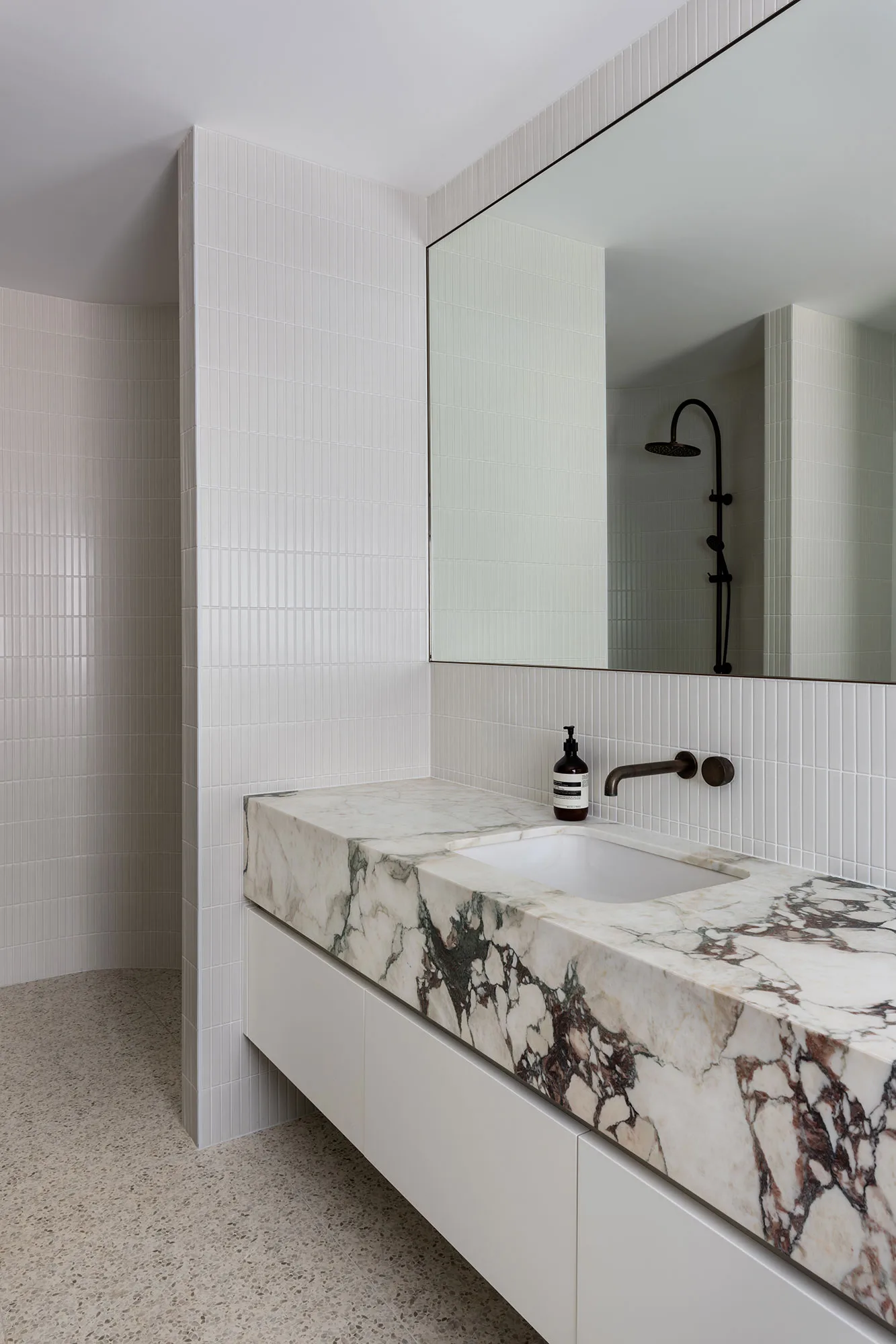 Room by Room Design — marble vanity with brushed brass tapware