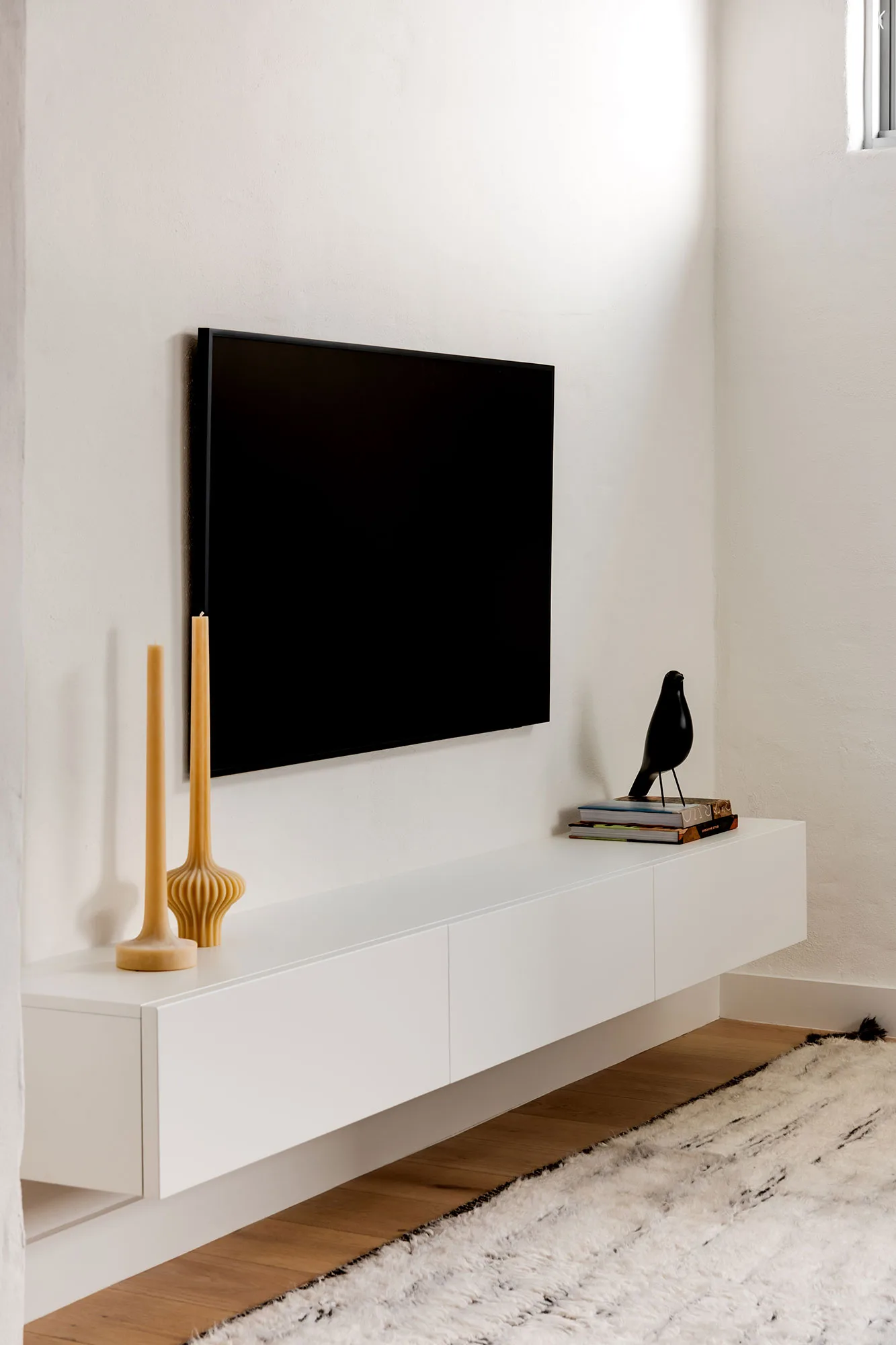 Room by Room Design — custom TV wall unit with floating joinery